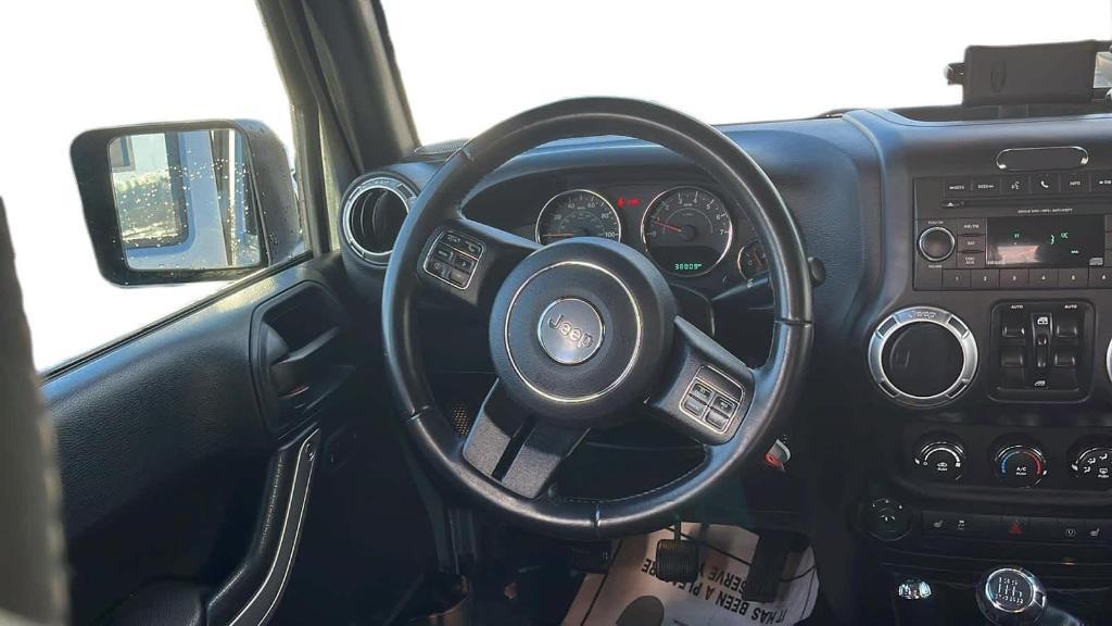 used 2016 Jeep Wrangler Unlimited car, priced at $23,208