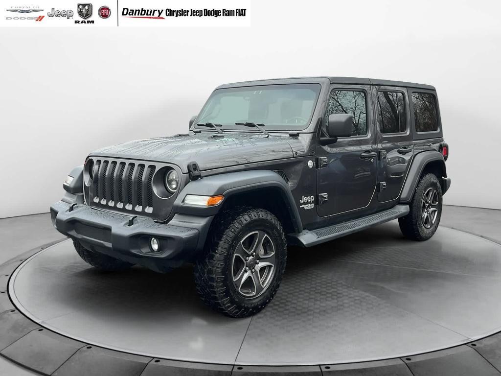 used 2018 Jeep Wrangler Unlimited car, priced at $13,944