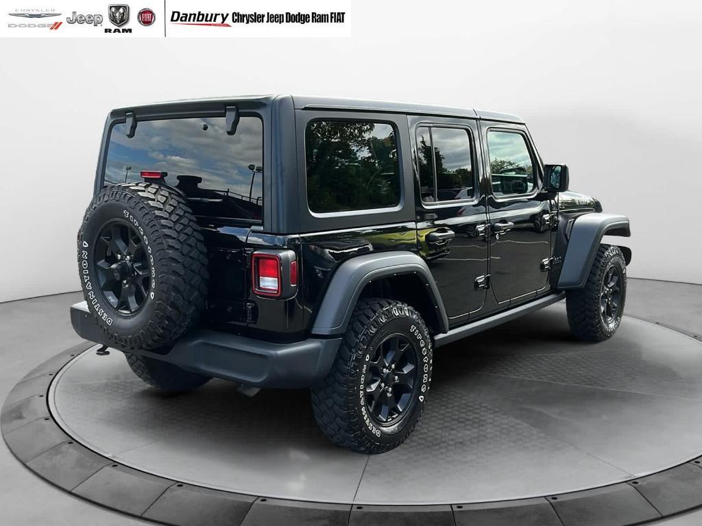 used 2021 Jeep Wrangler Unlimited car, priced at $32,837
