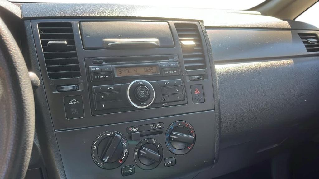 used 2012 Nissan Versa car, priced at $5,999