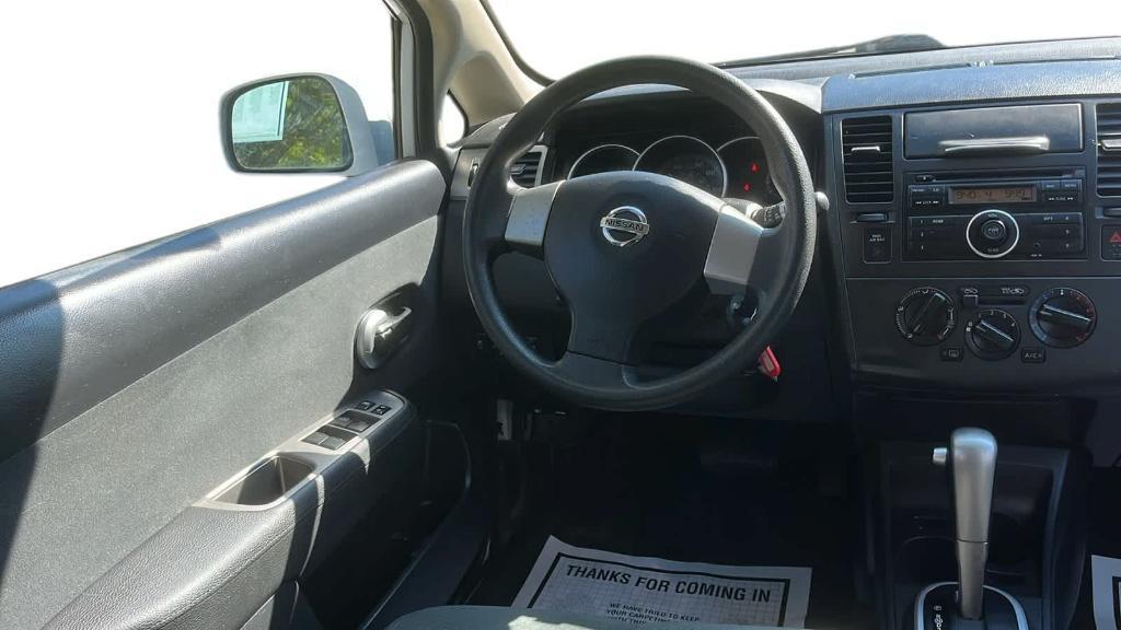 used 2012 Nissan Versa car, priced at $5,999