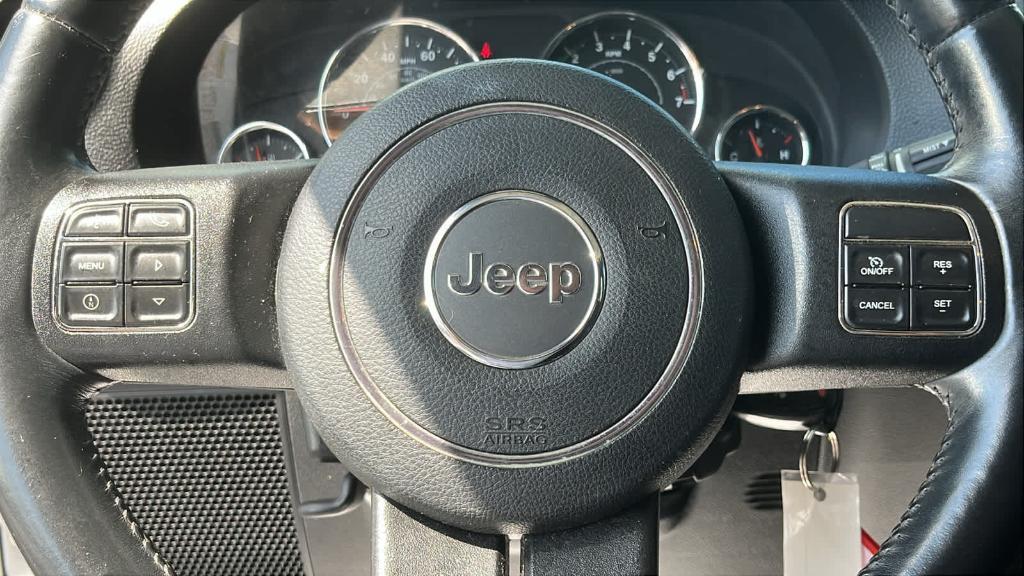 used 2013 Jeep Wrangler Unlimited car, priced at $11,492