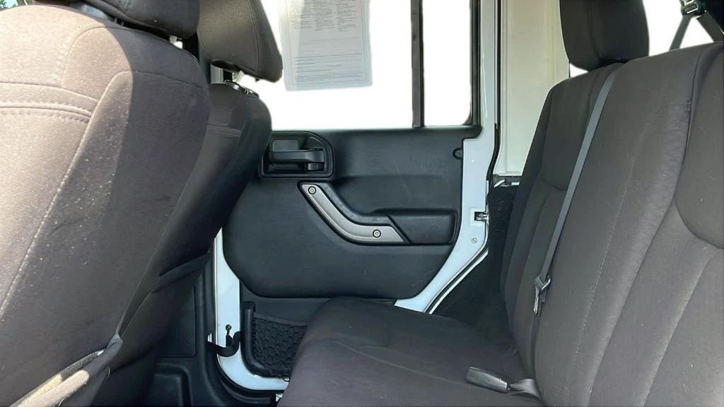 used 2013 Jeep Wrangler Unlimited car, priced at $11,492