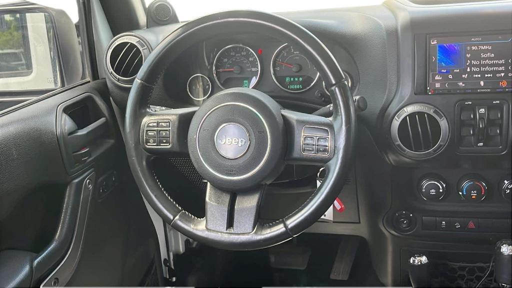 used 2013 Jeep Wrangler Unlimited car, priced at $11,492