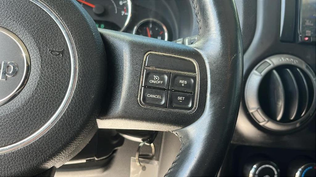 used 2013 Jeep Wrangler Unlimited car, priced at $11,492