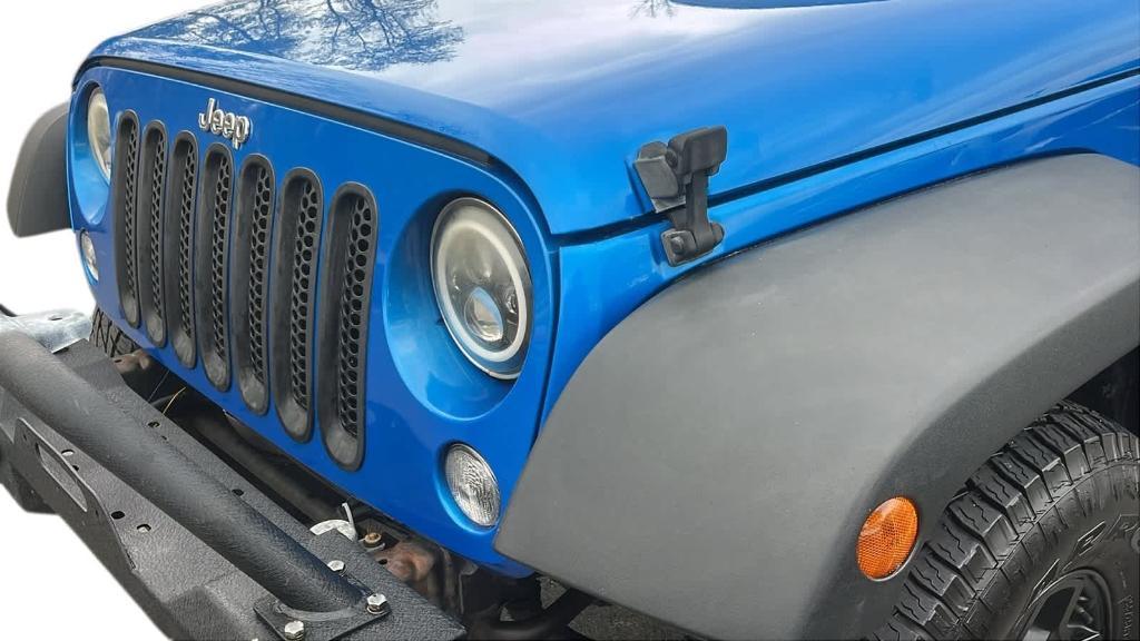 used 2016 Jeep Wrangler Unlimited car, priced at $13,924