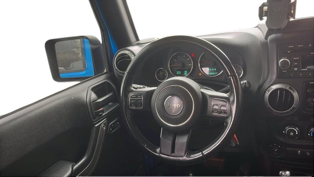 used 2016 Jeep Wrangler Unlimited car, priced at $13,924
