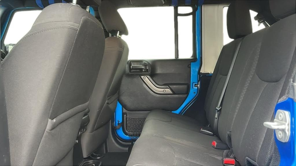 used 2016 Jeep Wrangler Unlimited car, priced at $13,924