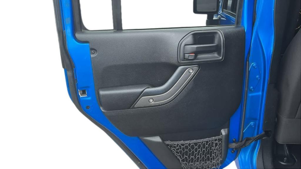 used 2016 Jeep Wrangler Unlimited car, priced at $13,924