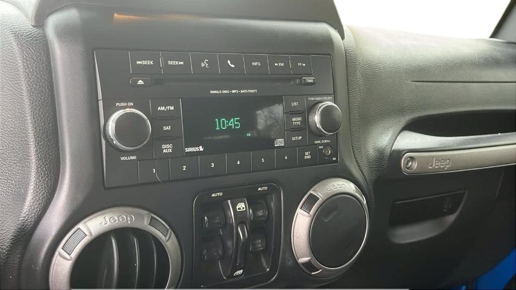 used 2016 Jeep Wrangler Unlimited car, priced at $13,924