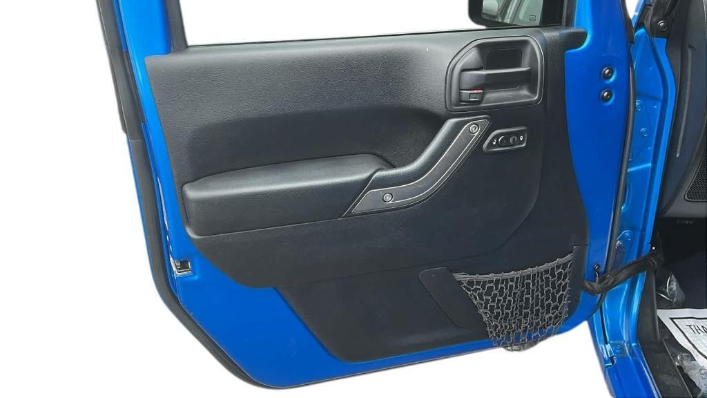 used 2016 Jeep Wrangler Unlimited car, priced at $13,924