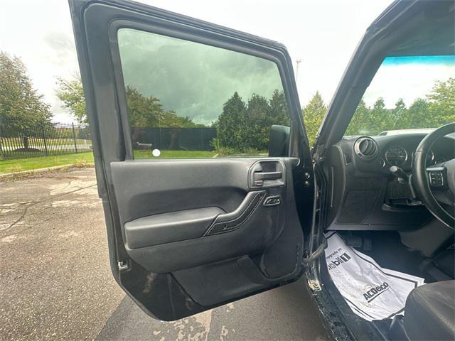 used 2015 Jeep Wrangler car, priced at $13,241
