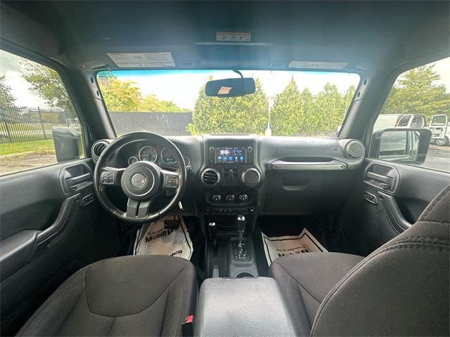used 2015 Jeep Wrangler car, priced at $13,241