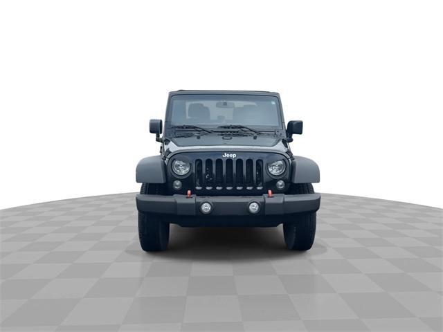 used 2015 Jeep Wrangler car, priced at $13,241