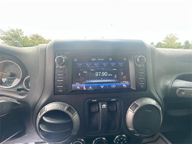 used 2015 Jeep Wrangler car, priced at $13,241