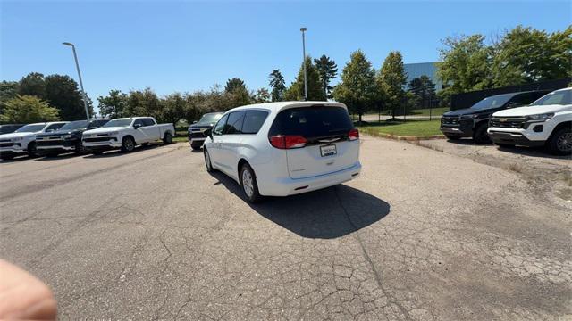 used 2023 Chrysler Voyager car, priced at $22,874
