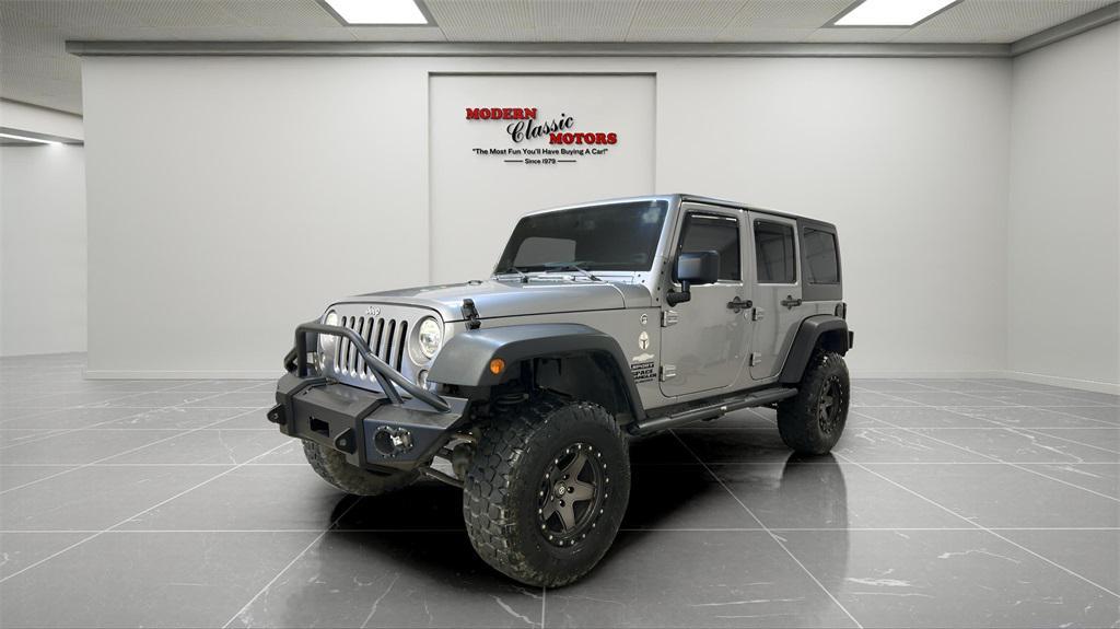used 2014 Jeep Wrangler Unlimited car, priced at $18,494