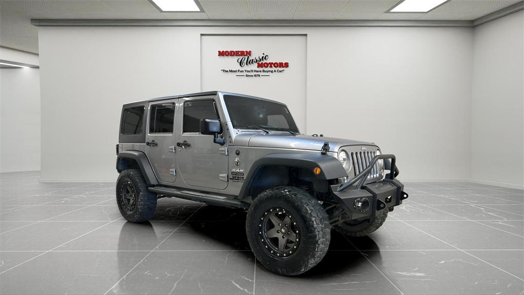 used 2014 Jeep Wrangler Unlimited car, priced at $18,494