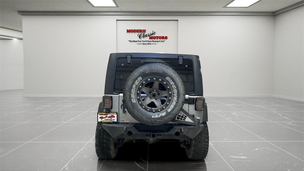 used 2014 Jeep Wrangler Unlimited car, priced at $18,494