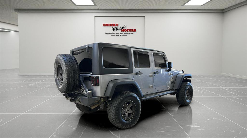 used 2014 Jeep Wrangler Unlimited car, priced at $18,494