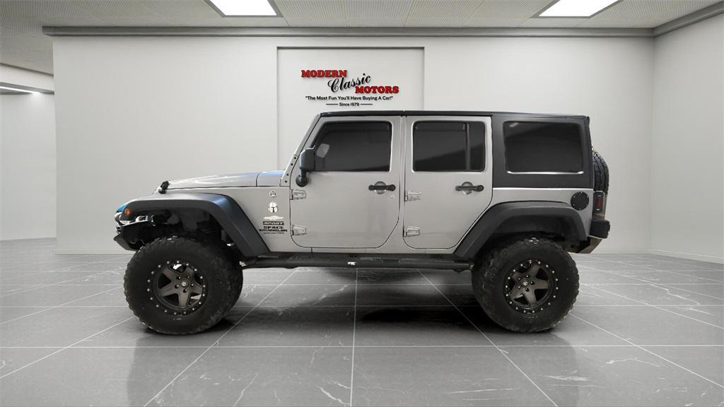 used 2014 Jeep Wrangler Unlimited car, priced at $18,494