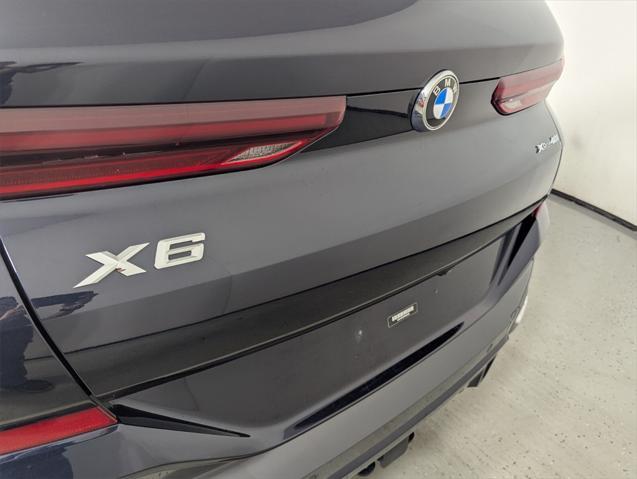 used 2023 BMW X6 car, priced at $57,470
