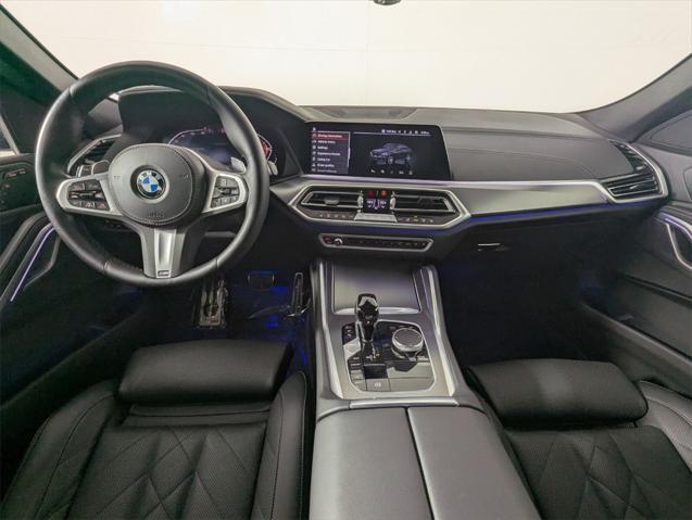 used 2023 BMW X6 car, priced at $57,470