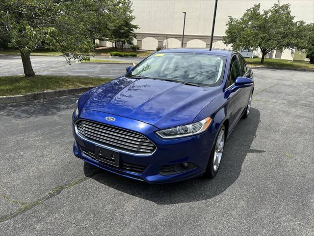 used 2014 Ford Fusion car, priced at $7,999