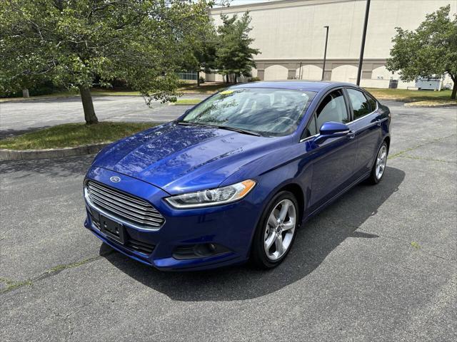 used 2014 Ford Fusion car, priced at $7,999