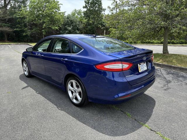 used 2014 Ford Fusion car, priced at $7,999