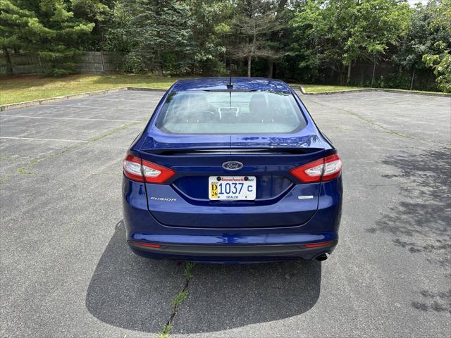 used 2014 Ford Fusion car, priced at $7,999