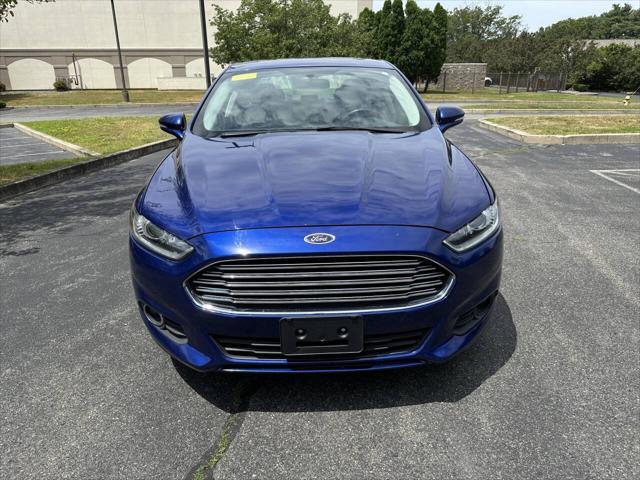 used 2014 Ford Fusion car, priced at $7,999