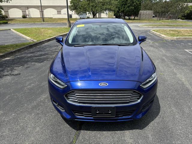 used 2014 Ford Fusion car, priced at $7,999