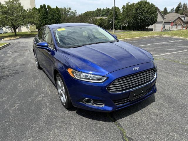 used 2014 Ford Fusion car, priced at $7,999