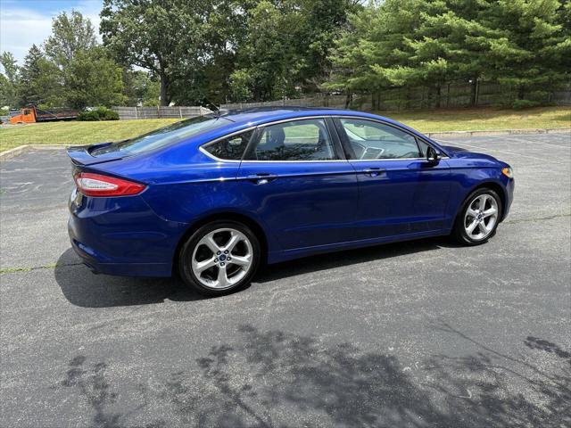 used 2014 Ford Fusion car, priced at $7,999