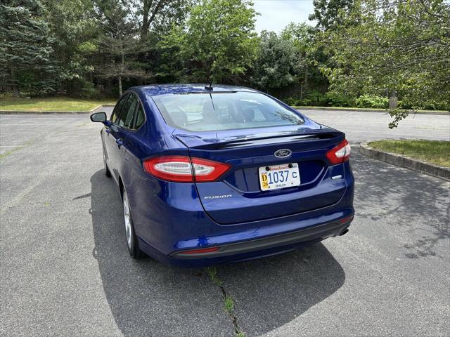 used 2014 Ford Fusion car, priced at $7,999