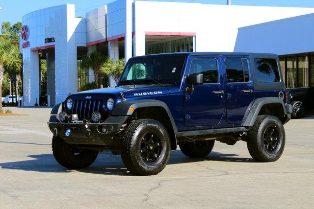 used 2013 Jeep Wrangler Unlimited car, priced at $19,920