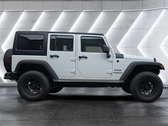 used 2013 Jeep Wrangler Unlimited car, priced at $16,972