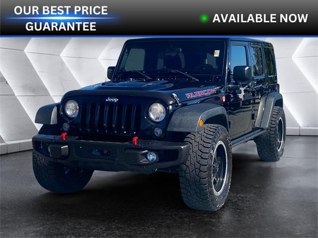 used 2014 Jeep Wrangler Unlimited car, priced at $21,972