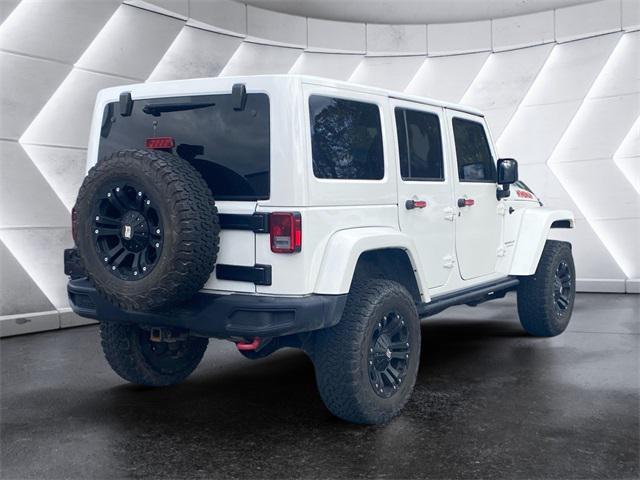 used 2015 Jeep Wrangler Unlimited car, priced at $25,972