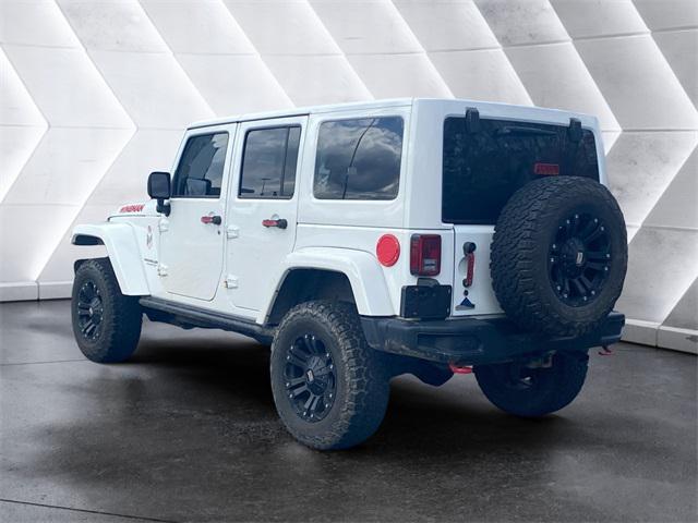 used 2015 Jeep Wrangler Unlimited car, priced at $25,972