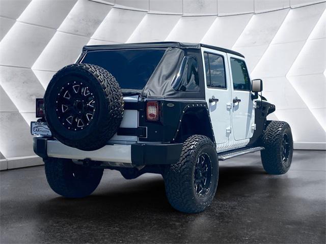 used 2017 Jeep Wrangler Unlimited car, priced at $23,872