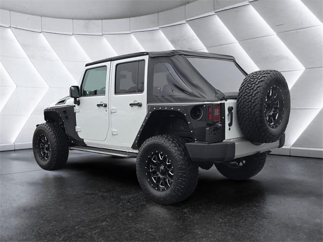 used 2017 Jeep Wrangler Unlimited car, priced at $23,972