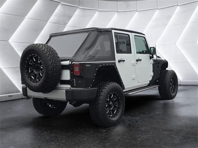 used 2017 Jeep Wrangler Unlimited car, priced at $23,972