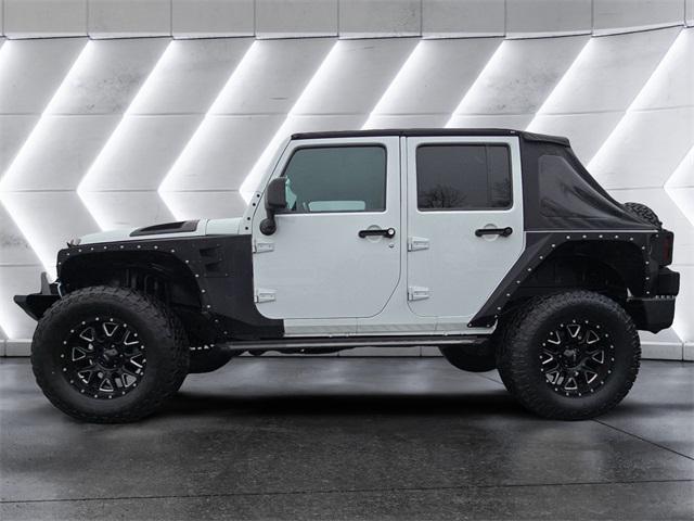 used 2017 Jeep Wrangler Unlimited car, priced at $23,972