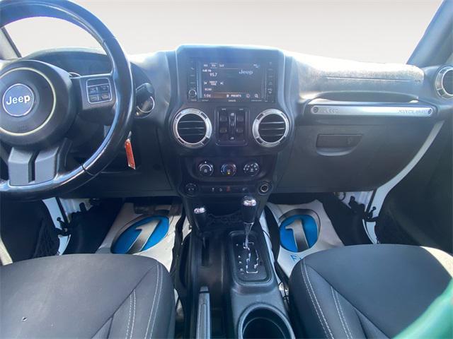 used 2017 Jeep Wrangler Unlimited car, priced at $23,872