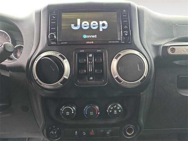 used 2017 Jeep Wrangler Unlimited car, priced at $23,972