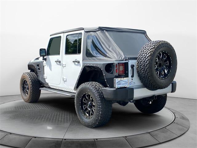 used 2017 Jeep Wrangler Unlimited car, priced at $23,272