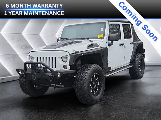 used 2017 Jeep Wrangler Unlimited car, priced at $23,972