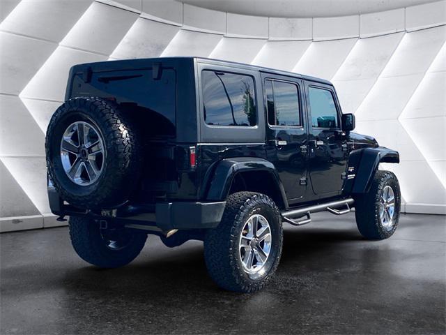 used 2016 Jeep Wrangler Unlimited car, priced at $24,472